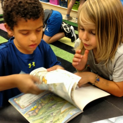 Jesse and Isaiah practice buddy reading.
